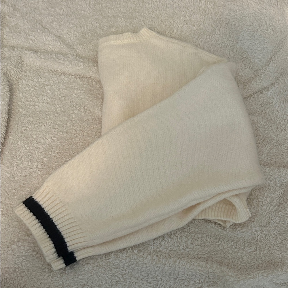 Cream Sweater with Black Trim